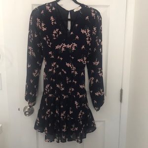 Flowey summer dress. Dark navy blue size medium. Worn once. Tie back